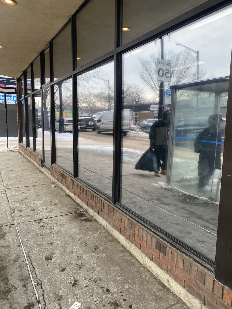 Street-facing storefront glazed with RockGlass hybrid sealed units along the full window line